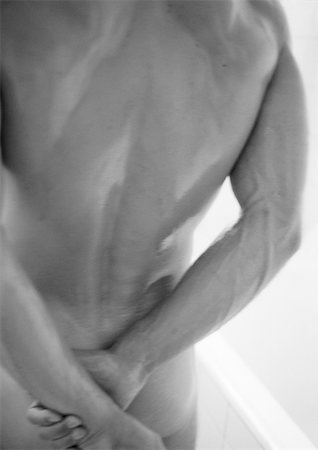 picture male back black and white - Nude man, mid-section, rear view, b&w Stock Photo - Premium Royalty-Free, Code: 695-03382138