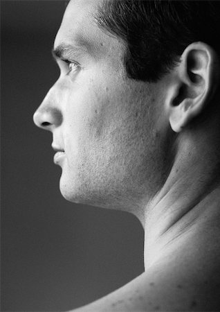 Man's face, side view, b&w Stock Photo - Premium Royalty-Free, Code: 695-03382139