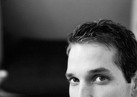 Partial view of man's face, black and white, close up. Foto de stock - Royalty Free Premium, Número: 695-03382629