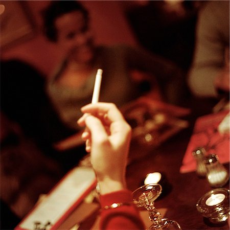 Hand holding cigarette. Stock Photo - Premium Royalty-Free, Code: 695-03382874