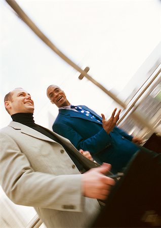 simsearch:614-07240000,k - Businessmen walking together, blurred. Foto de stock - Sin royalties Premium, Código: 695-03382898