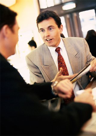 simsearch:632-01155457,k - Businessmen discussing Stock Photo - Premium Royalty-Free, Code: 695-03382915