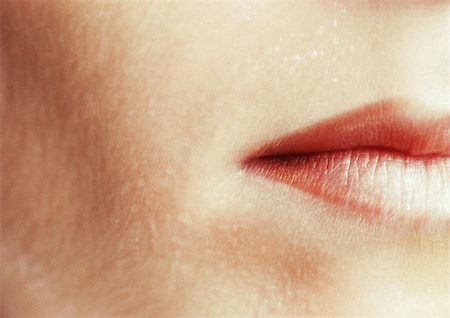 simsearch:695-03388489,k - Woman wearing lipstick, close up of cropped mouth. Stock Photo - Premium Royalty-Free, Code: 695-03383179