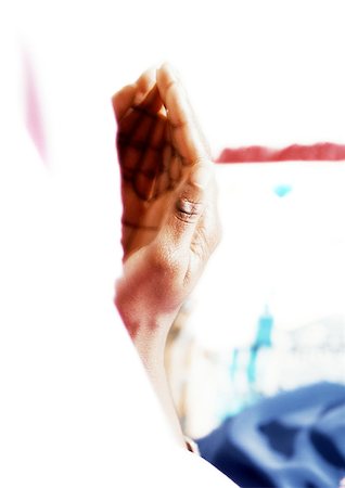 Close up of woman's hands in prayer. Stock Photo - Premium Royalty-Free, Code: 695-03383620