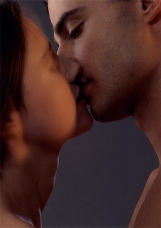 simsearch:695-03383724,k - Man and woman kissing, close up. Stock Photo - Premium Royalty-Free, Code: 695-03383716