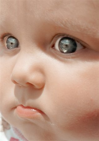 pouting angry baby face - Baby's face, close-up Stock Photo - Premium Royalty-Free, Code: 695-03383897