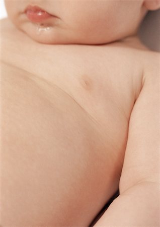 Baby's chin and belly, close-up Foto de stock - Sin royalties Premium, Código: 695-03383908