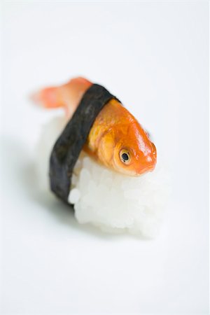 Goldfish prepared as nigiri sushi, close-up Stock Photo - Premium Royalty-Free, Code: 695-03390152