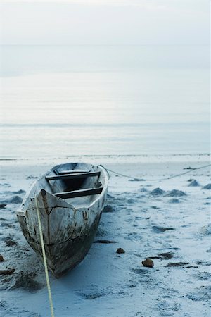 Tanzania, Zanzibar, dugout canoe on beach Foto de stock - Sin royalties Premium, Código: 695-03390581