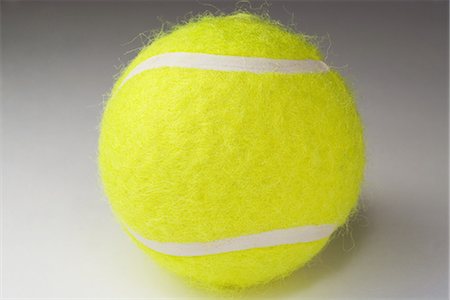 palla da tennis - Tennis ball, close-up Fotografie stock - Premium Royalty-Free, Codice: 696-05780726