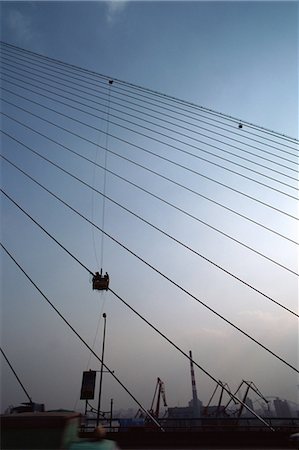 photo of civil engineering scaffolding - China, Shanghai, Apu suspension bridge Stock Photo - Premium Royalty-Free, Code: 696-05780766