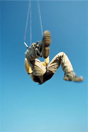 Man in mid air, kitesurfing Stock Photo - Premium Royalty-Free, Code: 696-05780784