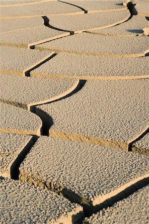 Cracked dry soil, full frame Foto de stock - Sin royalties Premium, Código: 696-03394794