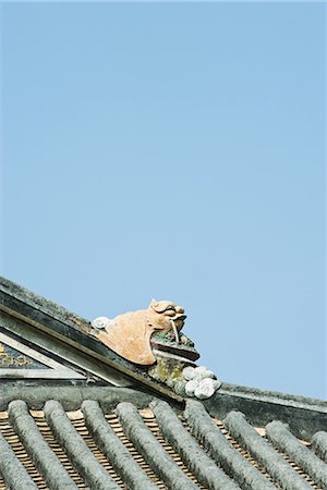 simsearch:696-03394943,k - Sculpted figure on roofline of Chinese temple Stock Photo - Premium Royalty-Free, Code: 696-03394941