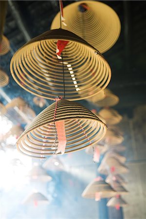 simsearch:696-03394943,k - Incense burning in Chinese temple, low angle view, close-up Stock Photo - Premium Royalty-Free, Code: 696-03394955