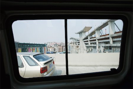 Urban scene viewed from car window Stock Photo - Premium Royalty-Free, Code: 696-03395018