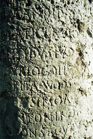 Text carved in stone, close-up, full frame Foto de stock - Sin royalties Premium, Código: 696-03395366