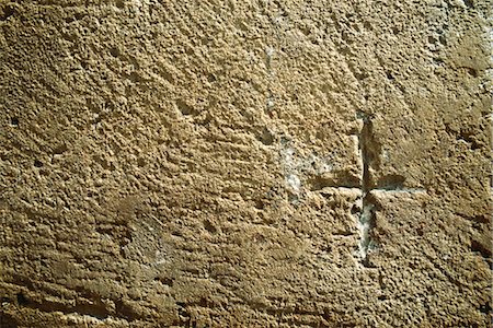 engraved - Cross carved into wall, close-up Stock Photo - Premium Royalty-Free, Code: 696-03395376