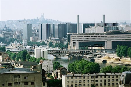 paris france overview of city - Paris, France, cityscape with Sacre Coeur in background Stock Photo - Premium Royalty-Free, Code: 696-03395385