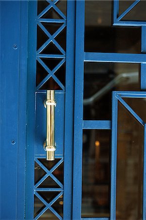 Metal and glass door with handle, close-up Stock Photo - Premium Royalty-Free, Code: 696-03395382