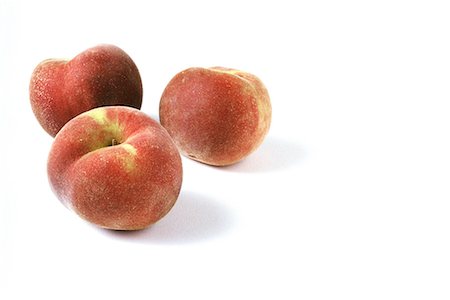 still life peaches - Three peaches, close-up Stock Photo - Premium Royalty-Free, Code: 696-03395524