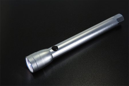 simsearch:695-05770356,k - Flashlight, close-up Stock Photo - Premium Royalty-Free, Code: 696-03395577