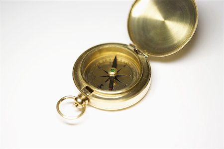 Brass compass, close-up Fotografie stock - Premium Royalty-Free, Codice: 696-03395584