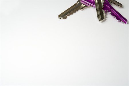 simsearch:696-03395595,k - Three keys, one purple, cropped Fotografie stock - Premium Royalty-Free, Codice: 696-03395580