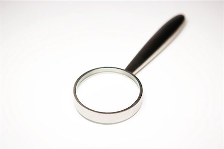 simsearch:696-03395678,k - Magnifying glass, close-up Foto de stock - Sin royalties Premium, Código: 696-03395664