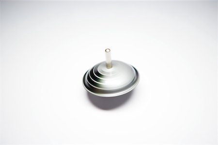 Spinning toy top, close-up Stock Photo - Premium Royalty-Free, Code: 696-03395668