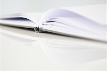 page - Open book, low angle view Stock Photo - Premium Royalty-Free, Code: 696-03395846