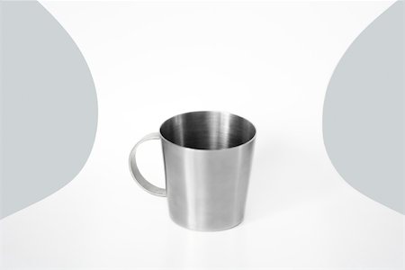 empty space for design - Metal cup on a chair, close-up Stock Photo - Premium Royalty-Free, Code: 696-03396049