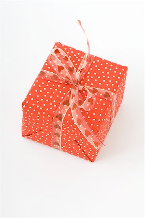 simsearch:633-01274235,k - Wrapped gift, red and white polka dots Stock Photo - Premium Royalty-Free, Code: 696-03396079