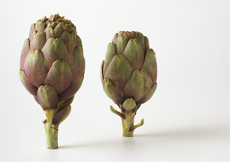 stem vegetable - Artichokes against white background Stock Photo - Premium Royalty-Free, Code: 696-03396141