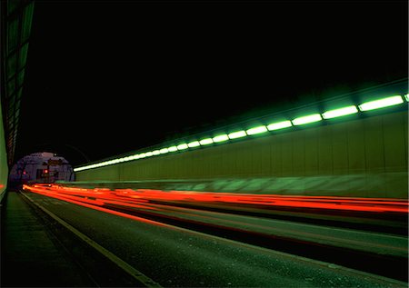 Light trails in tunnel Stock Photo - Premium Royalty-Free, Code: 696-03396219