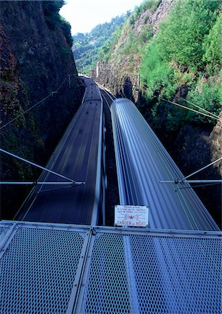 simsearch:400-03977018,k - Trains passing between mountains Stock Photo - Premium Royalty-Free, Code: 696-03396247