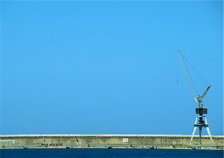 dike - Sea wall with crane Stock Photo - Premium Royalty-Free, Code: 696-03396329