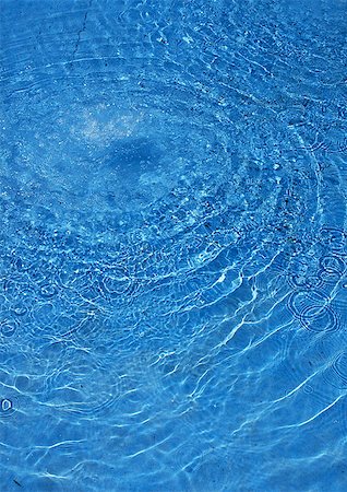 photography water ripples circles - Rings in blue water Stock Photo - Premium Royalty-Free, Code: 696-03396869