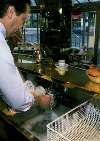 simsearch:6109-08489043,k - Man washing glasses in cafe Stock Photo - Premium Royalty-Free, Code: 696-03396888