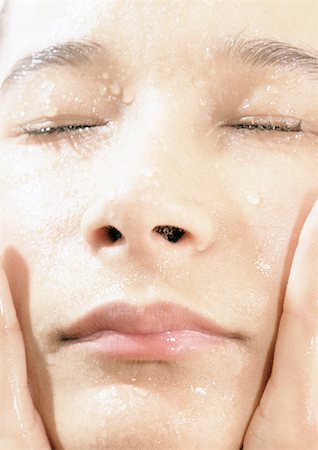 simsearch:696-03400450,k - Person's wet face, close-up Stock Photo - Premium Royalty-Free, Code: 696-03396897