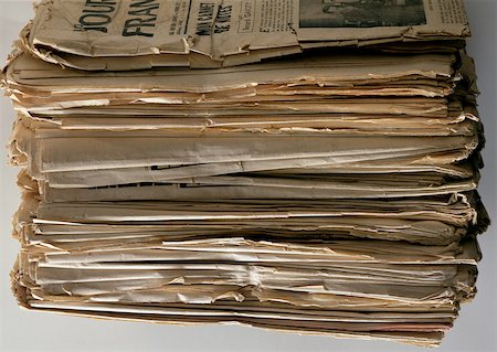 simsearch:700-03003493,k - Pile of old newspaper, close-up Stock Photo - Premium Royalty-Free, Code: 696-03396963