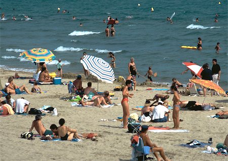 sunbathing crowd - Crowded beach Stock Photo - Premium Royalty-Free, Code: 696-03397015