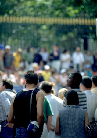 Crowd of spectators at outdoor event Stock Photo - Premium Royalty-Free, Code: 696-03397018