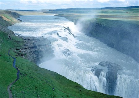 Iceland, Gullfoss waterfall, cascade and spray in green landscape Foto de stock - Sin royalties Premium, Código: 696-03397113