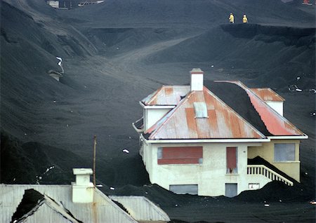 Iceland, houses half buried in volcanic ash Stock Photo - Premium Royalty-Free, Code: 696-03397178