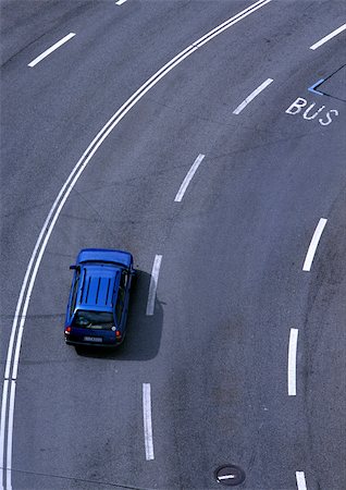 Blue car on highway, birdseye view. Stock Photo - Premium Royalty-Free, Code: 696-03397515
