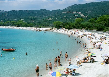 sunbathing crowd - France, Corsica, crowded beach, high angle view Stock Photo - Premium Royalty-Free, Code: 696-03397537