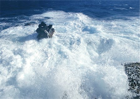 simsearch:633-02645542,k - Waves crashing on rocky shore Stock Photo - Premium Royalty-Free, Code: 696-03397554