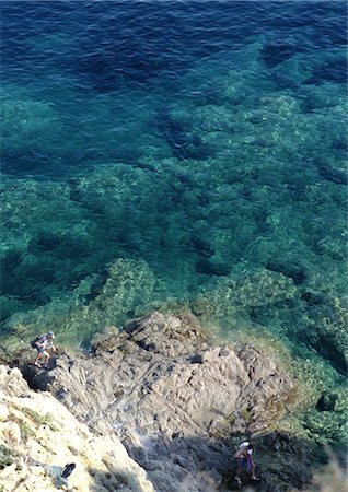 simsearch:696-03397638,k - France, Corsica, people fishing on rocks, high angle view Stock Photo - Premium Royalty-Free, Code: 696-03397605