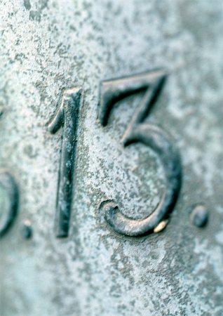 simsearch:696-03397870,k - 13 text, embossed on stone. Stock Photo - Premium Royalty-Free, Code: 696-03397788